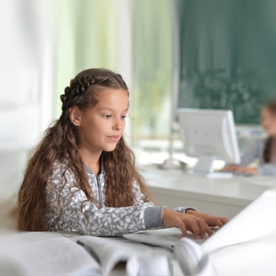 Subject working on a laptop for the Gifted Program