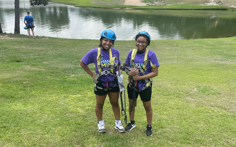 Alabama Connections Academy students having fun during a field day in a ropes harness