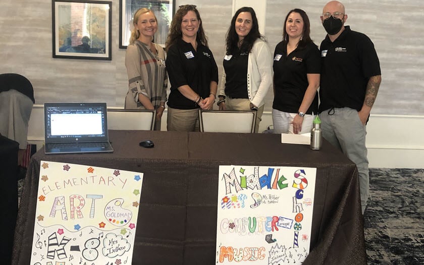 TECCA's Elective Teachers are excitedly waiting to meet their new students at our Welcome Back to School event