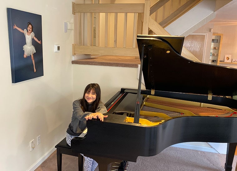 TECCA student, Sana L., uses the school's flexible schedule to practice piano.