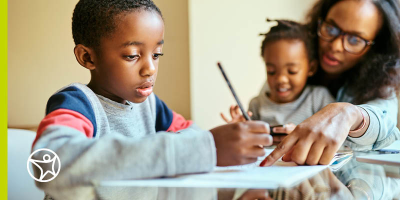 Student writing in a Journal